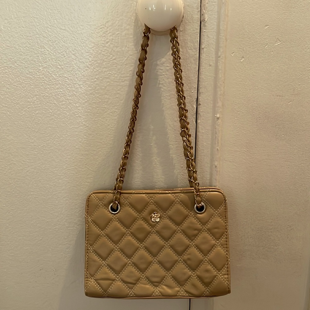 Tan quilted purse. Gold details and gold and tan chain strap